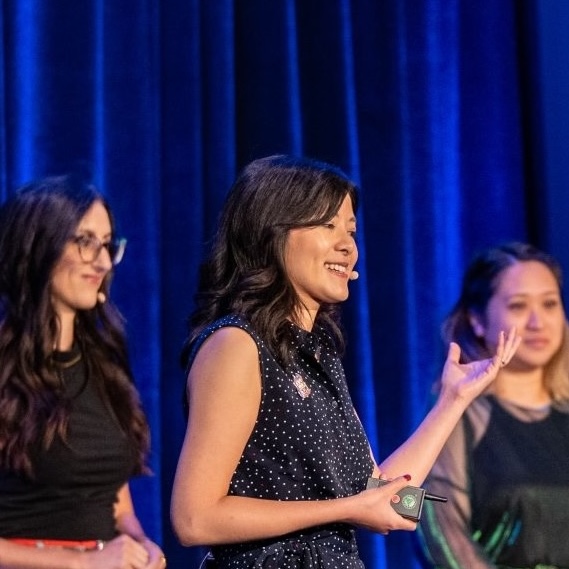 Caroline sitting under a tree